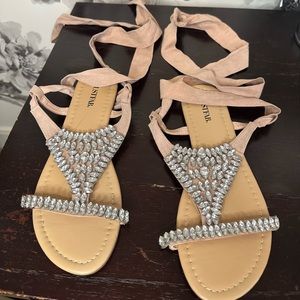 Rhinestone and lace up flip flops